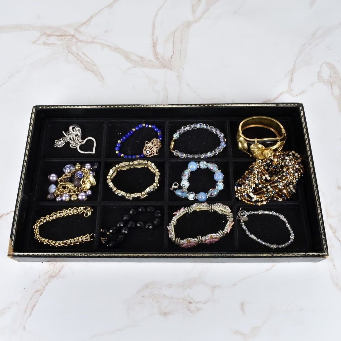Collection of Fashion Bracelets: Collection of Twelve Vintage Fashion Bracelets. Variously accented with faux diamonds and gemstones, beads, enamel and more. Various styles and makers. Condition: Good vintage condition. Estimate: $50