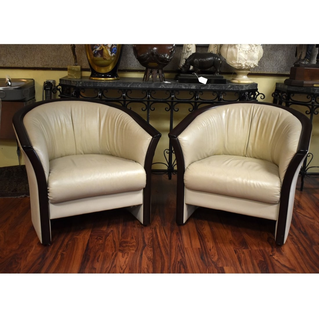 Pair of Ekornos Lounge Chairs: Pair of Ekornos Scandinavian Mid Century Modern Leather and Teak Wood Lounge Chairs. Factory label affixed on the bottom side. Measures 30" x 33", 17" seat height. Condition: Minor surface rubbing to 