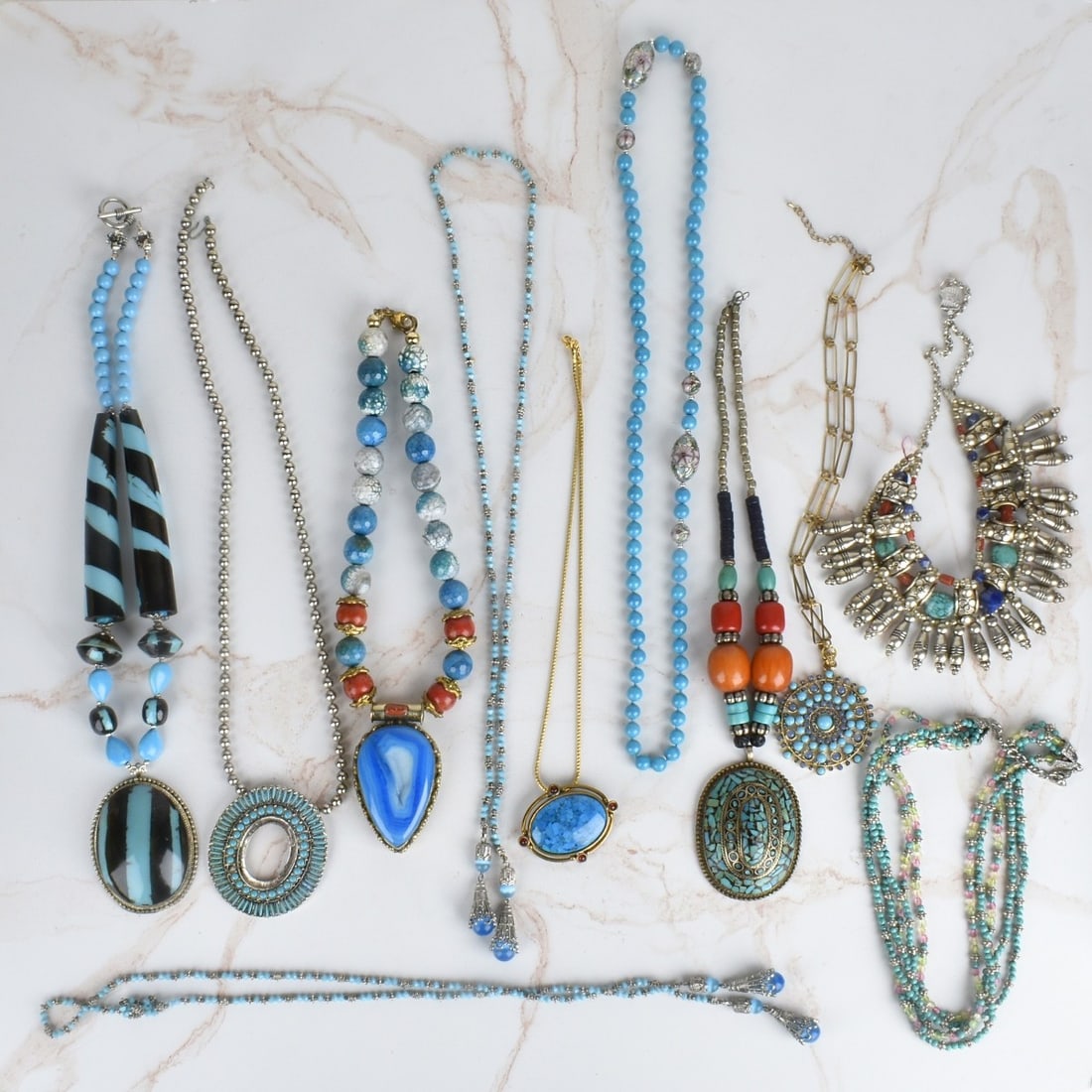 Collection of Fashion Jewelry: Collection of Vintage Fashion Jewelry. To include eleven necklaces variously accented with turquoise, turquoise color bead, agate, lapis lazuli bead and others set in gold and silver tone metal. Vario