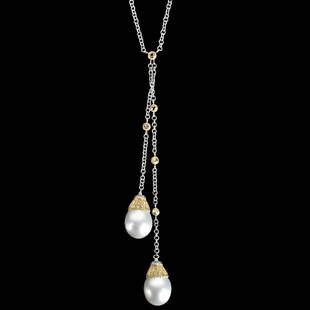 Buccellati Rolo Lariat Necklace: Buccellati Rolo South Sea Pearl, 2.54 Carat TW Rose Cut Diamond and 18 Karat Yellow and White Gold Lariat Necklace. Pearls measure 15.5mm. Necklace measures 17" L, 5" drop. Approx. weight: 32.57 grams