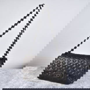 Chanel Double Flap Shoulder Bag: Chanel Double Flap Quilted Leather Shoulder Bag. Double C closure with twist lock. Patch pockets on interior with storage and zip pocket. Measures 6-1/4" x 11-3/4" x 3-1/2". Provenance: The Orianne Co