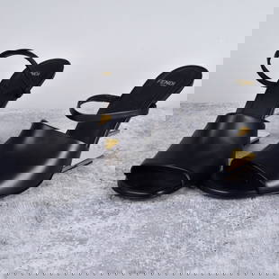 Fendi First Sandals: Fendi Black Leather First Sandals. Marked on the bottom side. Size: 38. Provenance: The Orianne Collins Collection. A large portion of proceeds of this sale will be donated to Ms Collins’ charity of