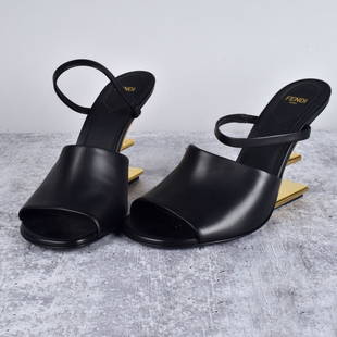 Fendi First Sandals: Fendi Black Leather First Sandals. Marked on the bottom side. Size: 38. Provenance: The Orianne Collins Collection. A large portion of proceeds of this sale will be donated to Ms Collins’ charity of