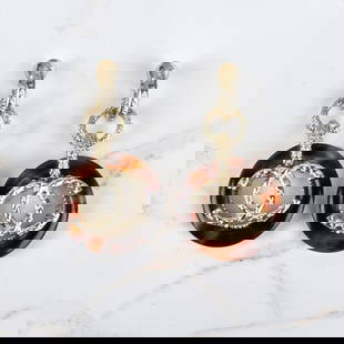 Pair of Chanel Earrings: Pair of Chanel CC Faux Tortoise Shell Earrings in Original Box. Original tag included with the lot. Measures 1-1/2" diam., 1/2". Provenance: The Orianne Collins Collection. A large portion of proceeds