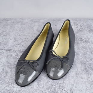 Chanel Double CC Leather Ballet Flats: Chanel Double CC Leather Ballet Flats with Capped Toe. Serial: A G02819. Size: 8. Provenance: The Orianne Collins Collection. A large portion of proceeds of this sale will be donated to Ms Collins’