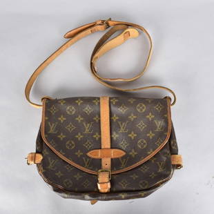 Louis Vuitton Saumur Crossbody Bag: Louis Vuitton Saumur Monogram Canvas Crossbody Bag. Stitch label. Gold tone hardware. Measures 9" x 11-1/4" x 3-1/2". Condition: Used condition. Has some spotting to the interior. Needs cleaning. Esti