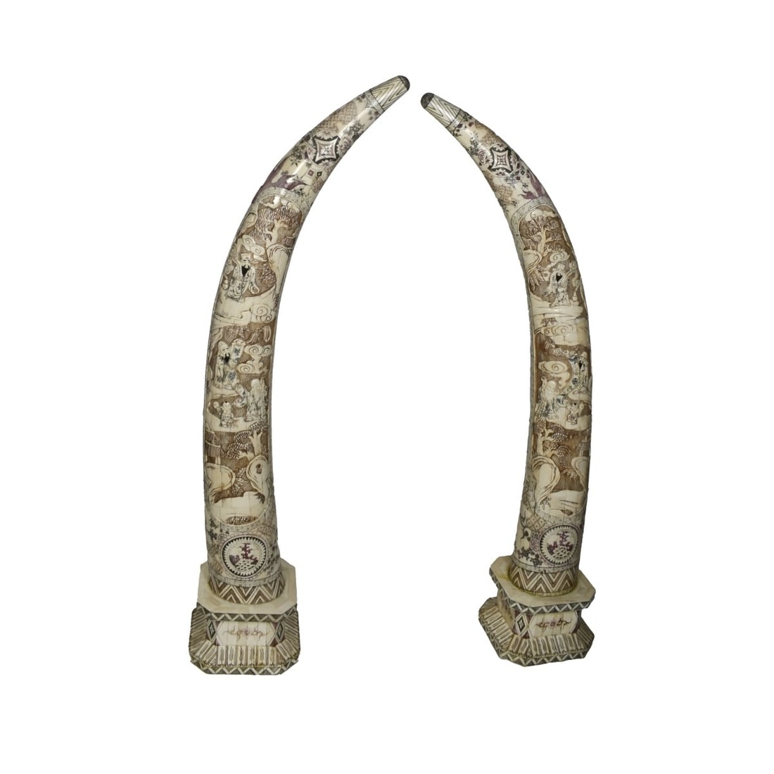 Pr Polychrome Chinese Bone Tusks: Pair Chinese Tessellated Polychrome Carved Bone and Bone Veneer Tusks on Stands, and features relief carved Immortals with Scrolls, floral and vining design with medallions to the verso. Each tusks si