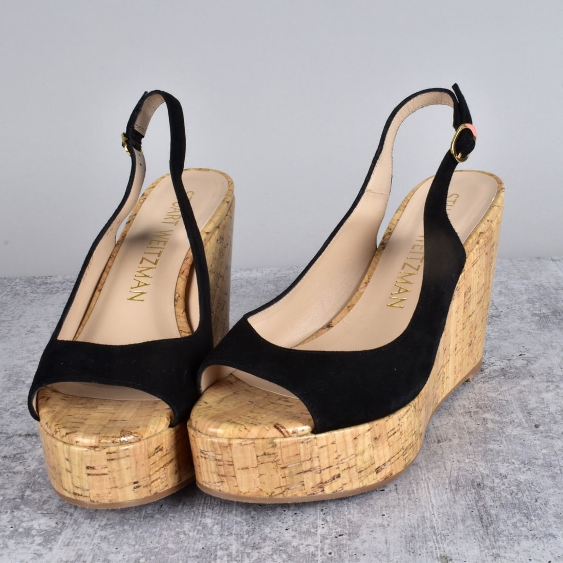 Stuart Weitzman Sandals: Stuart Weitzman Suede Wedge Sandals. Marked on the base. Size: 7-1/2. Provenance: The Orianne Collins Collection. Condition: New condition. Estimate: $500.00 - $400.00 Domestic Shipping: $58.00
