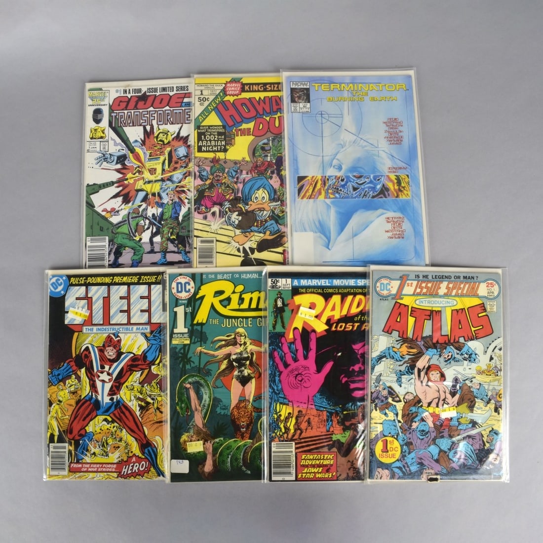 Seven Marvel and DC Comic Books (1 of 3)