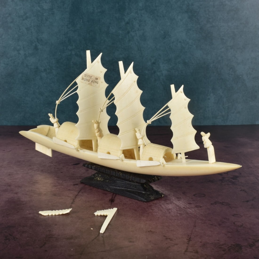 Chinese Carved Boat: Chinese Carved Boat with Three Sails Presented on a Wooden Base. Box to accompany the lot. Boat overall measures 4-3/4" x 9-3/4" x 1-1/4". We Will Not Ship This Item Out of State of Florida. Anyone Ha