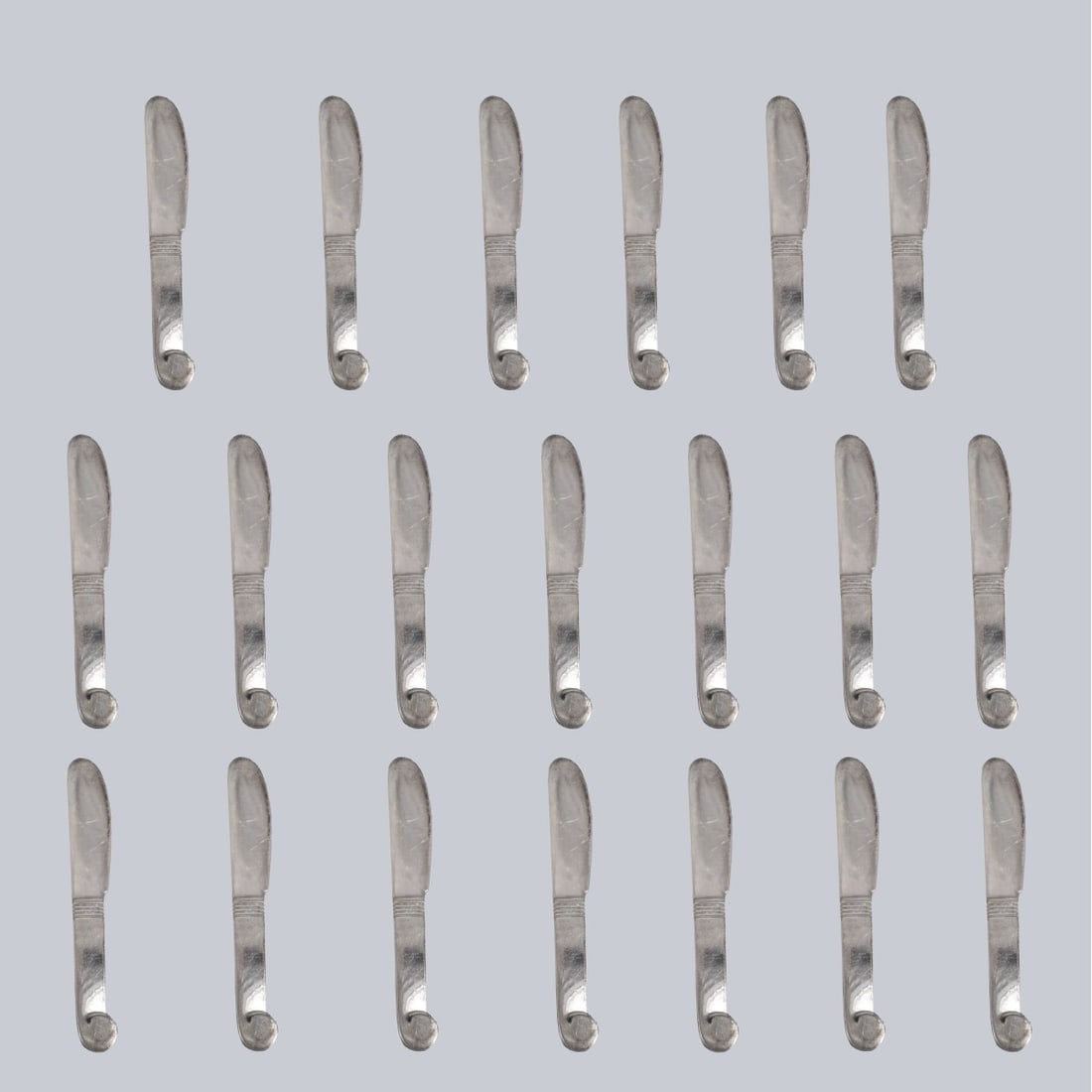 (20) Christofle Butter Spreaders: Set of Twelve (20) Christofle Art Deco Style Butter Spreaders. Stamped. Measures 3-7/8". Condition: Spreaders need a minor cleaning otherwise good condition. Estimate: $50.00 - $150.00 Domestic Shippi