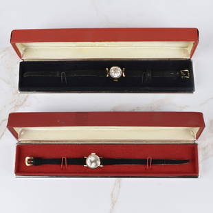 Vintage Lady's Watches: Two Lady's Vintage Watches. To include Midland 18 Karat Yellow Gold Watch, Manual Wind Movement and Doxa Gold Filled Watch, Manual Wind Movement. Midland case measures 16.5mm. Doxa case measures 16.5m