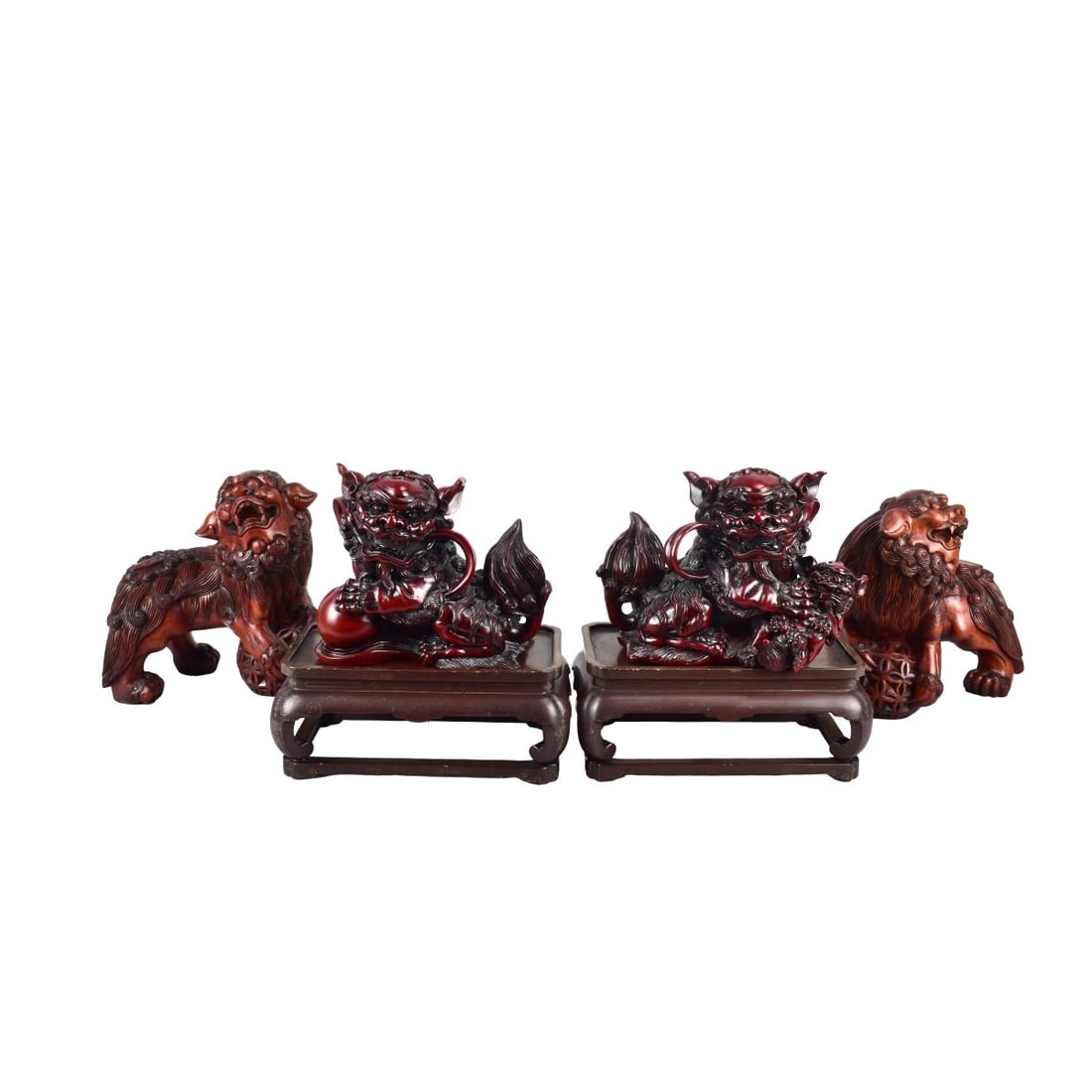 4 Modern Foo Dogs: Four (43) Modern Foo Dogs, Two Matching holding balls Measures 8-1/2" x 7-3/4"L on Vintage Wood Laquer Stands Measuring 4"H x 9-1/2"L. One holding a ball and one holding a dog baby. Measures 6"H x9"L 