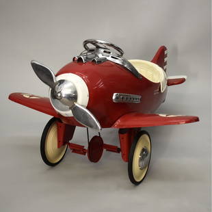 Sky King Pedal Car: Limited Edition Airflow Collectibles Inc. Metal Replica of the Sky King Airplane Pedal Car by Viktor Schreckengost. Measures 24-1/2" x 37" x 47". Condition: Rubbing, scuffs, and scratches to the surfa