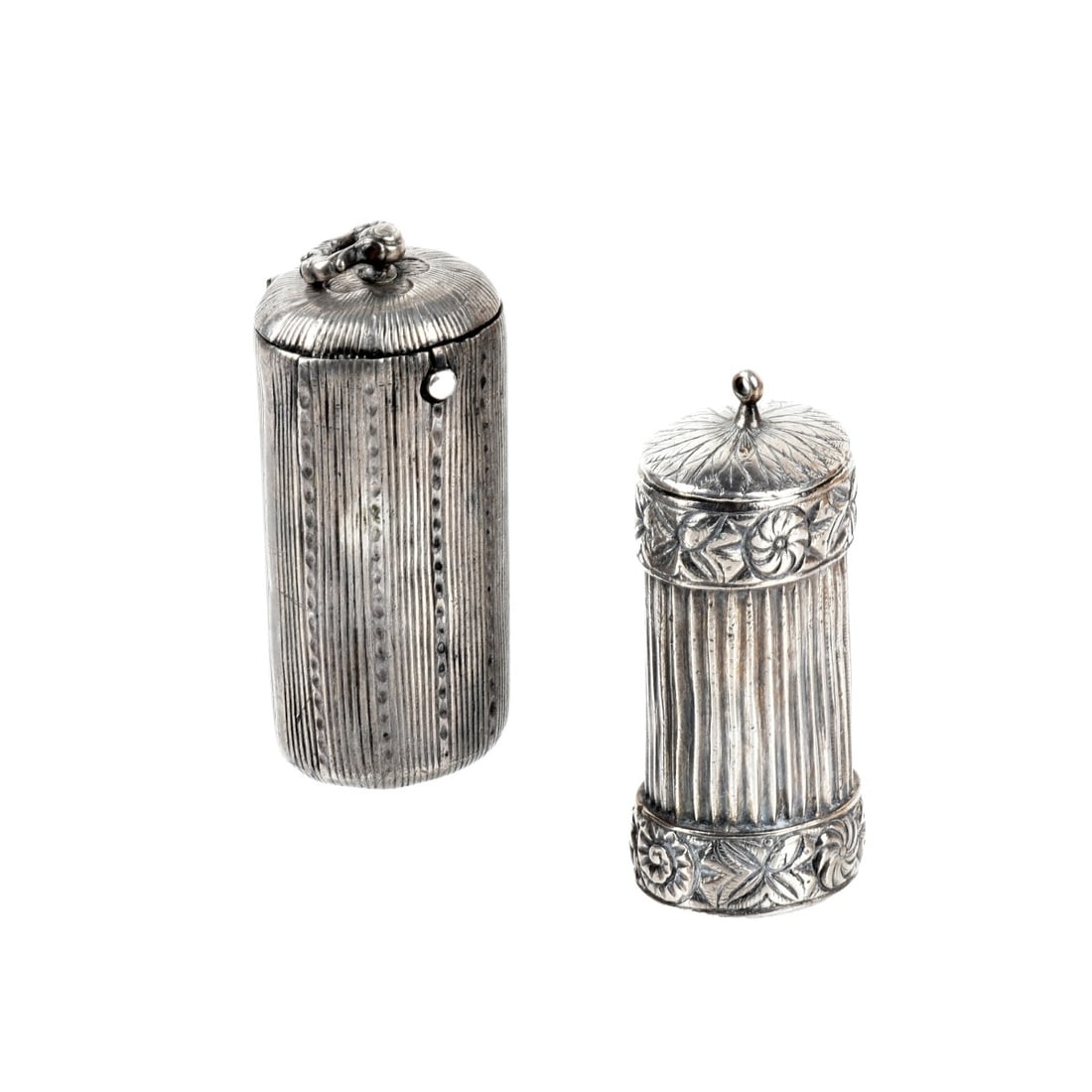 Antique Spanish Colonial Silver Containers: Antique 18/19th Century Spanish Colonial Handmade Silver Containers. One with floral design and sliding interior compartment. The other with pop-up hinged lid. Taller measures 2-3/4"H, 1-1/8" W. Appro