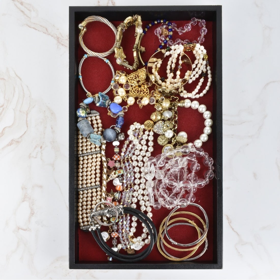 Collection of Fashion Bracelets: Collection of Twenty-three Vintage Fashion Bracelets. Variously accented with faux diamonds, faux pearls, beads, enamel and more. Various styles and makers. Condition: Good vintage condition. Estimate