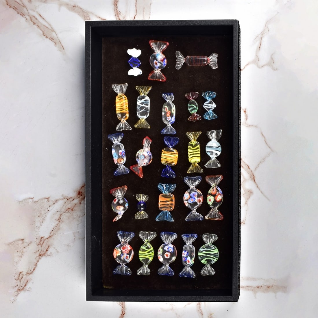 Vintage Murano Art Glass Candy Ornaments: Lot of Twenty Three Vintage Murano Art Glass Candy Ornaments. Largest measures 2-1/4'. Condition: A few has chips to the surface otherwise good condition. Estimate: $50.00 - $150.00 Domestic Shipping: