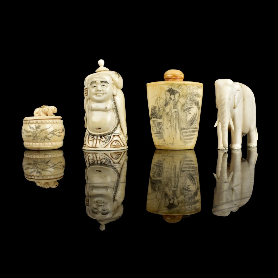 Grouping of Four Table Top Items: Grouping of Four Table Top Items. Includes: Japanese polychrome bone snuff bottle, African elephant, Chinese polychrome snuff bottle, and Chinese miniature box. Tallest snuff bottle measures 3-1/4" x 