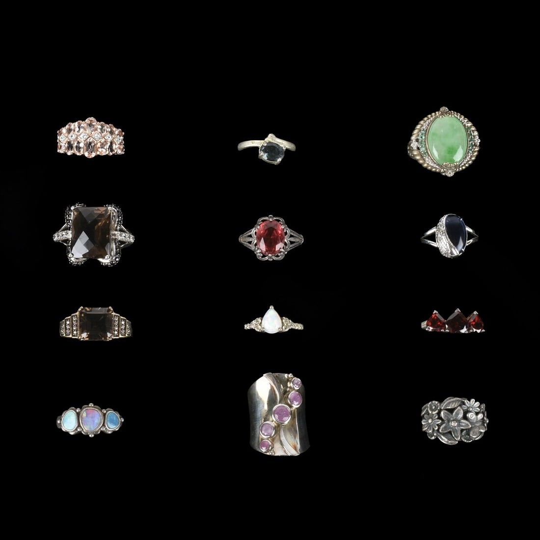Fashion Jewelry Silver Rings: Collection of Twelve Fashion Jewelry Sterling Silver Rings. Variously accented with faux gemstones, faux diamonds, hardstones and more. Various sizes. Most stamped 925. Approx. total weight: 58.50 gra