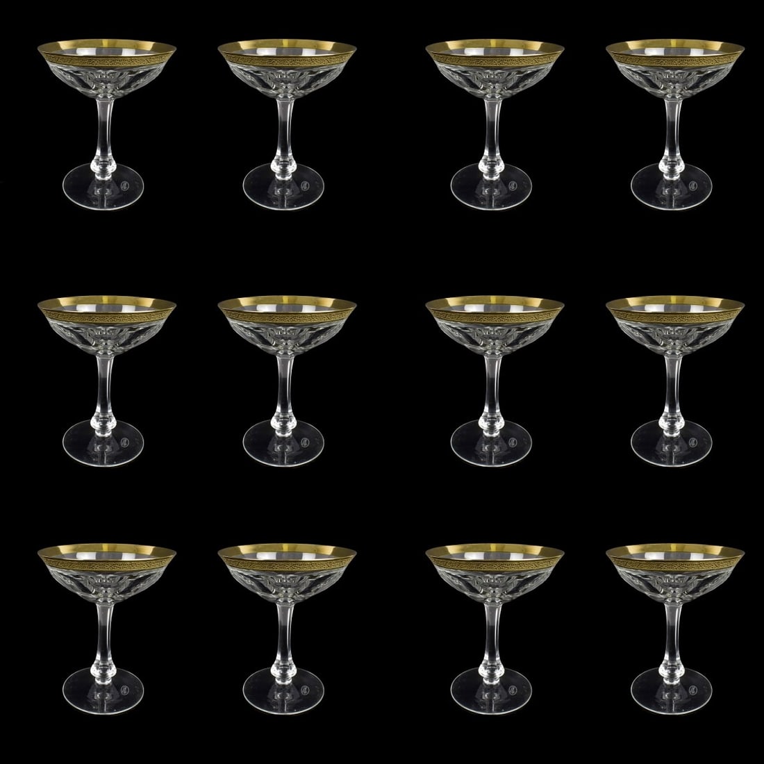 Moser "Lady Hamilton" Gold Champagne Glasses: Moser "Lady Hamilton" Gold encrusted rim Champagne Crystal Glasses. Measures 5-1/8" H. Condition: Good Condition. Estimate: $200.00 - $400.00 Domestic Shipping: Third Party