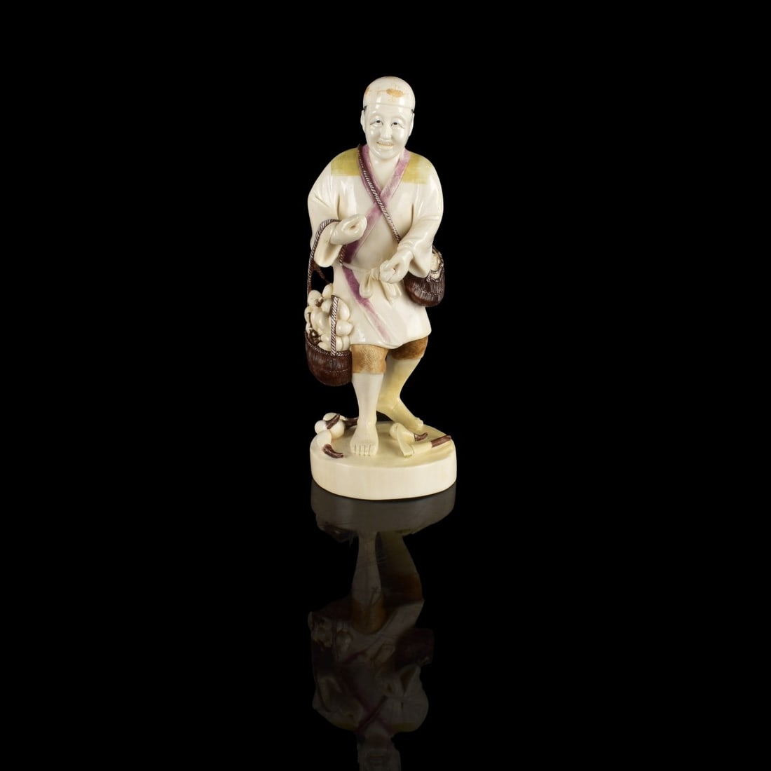 Antique Japanese Carved Figurine: Antique Japanese Polychrome and Carved Figurine of a Man Holding a Basket. Signed on the base. Measures 9-5/8" x 3-5/8". We Will Not Ship This Item Out of State of Florida. Anyone Having This Item Shi