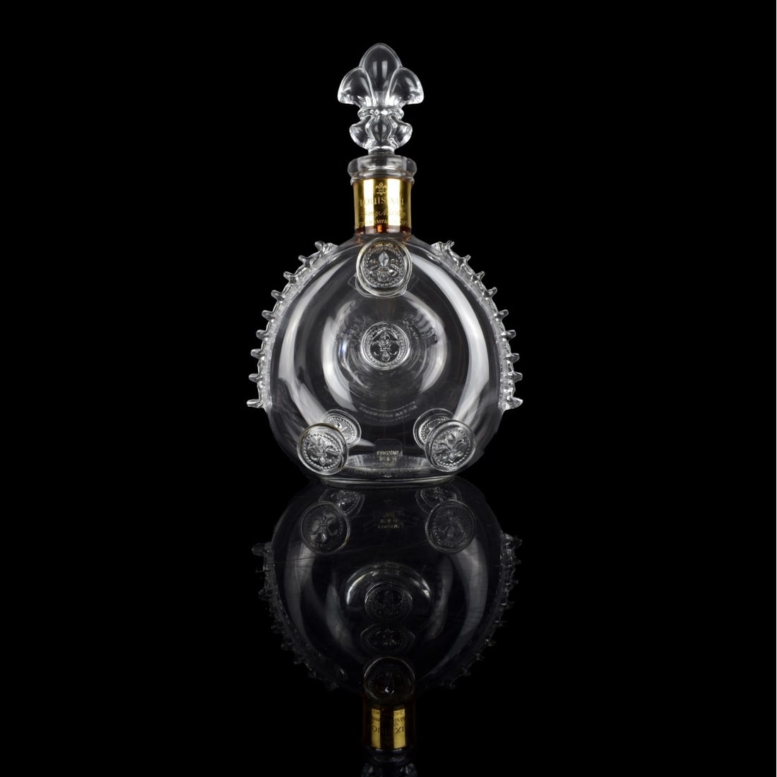 Baccarat Remy Martin Louis XIII Decanter: Baccarat Remy Martin & Cie Louis XIII Crystal Decanter. Signed on the base. Measures 11-1/4" x 7". Condition: Stopper has a small chip to the base otherwise good condition. Estimate: $100.00 - $200.00