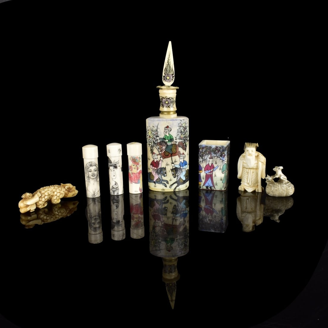 Grouping of Assorted Tableware: Grouping of Eight Assorted Tableware. Includes: three Japanese netsuke figurines, Persian hand painted snuff bottle, Persian tooth pick holder, and three miniature covered jars. Snuff bottle measures 