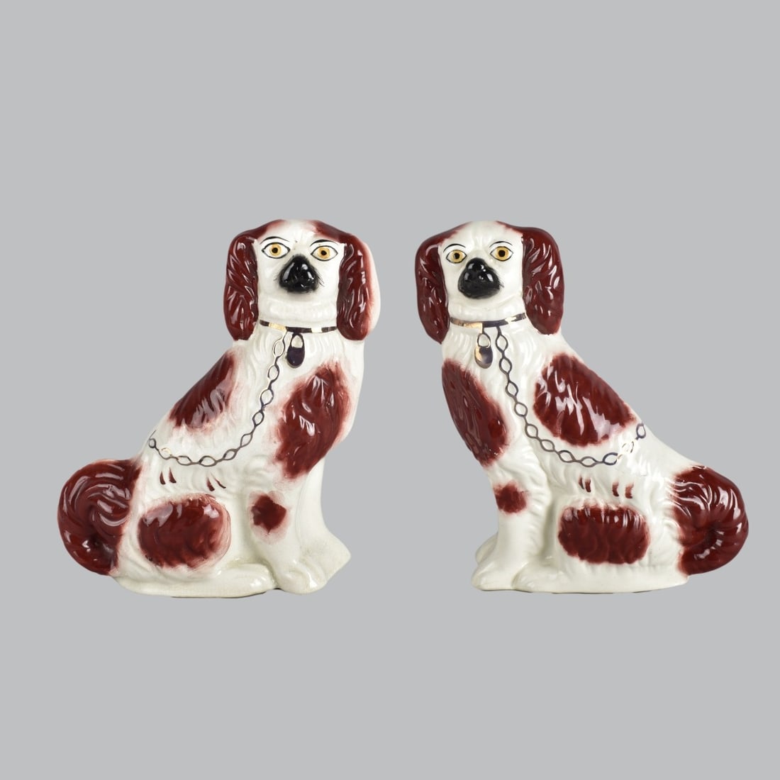 Pair Antique Staffordshire Porcelain Dogs: Pair Antique Staffordshire Porcelain Dogs. Signed to Bottom. Measures 7'H x 5-1/2"W Condition: Good Condition, scratching to tail Estimate: $100.00 - $200.00 Domestic Shipping: $53.00