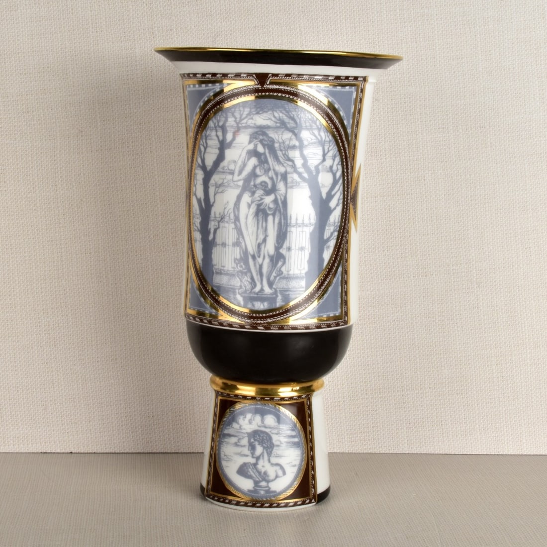 Russian Porcelain Vase: Russian Porcelain Vase with an Inscription and Designer Marked on the Bottom. Decorated with gothic scenes around the vase within reserves with bright gold enamel. Circa 2005. Measures: 13-1/2" H, 7-1
