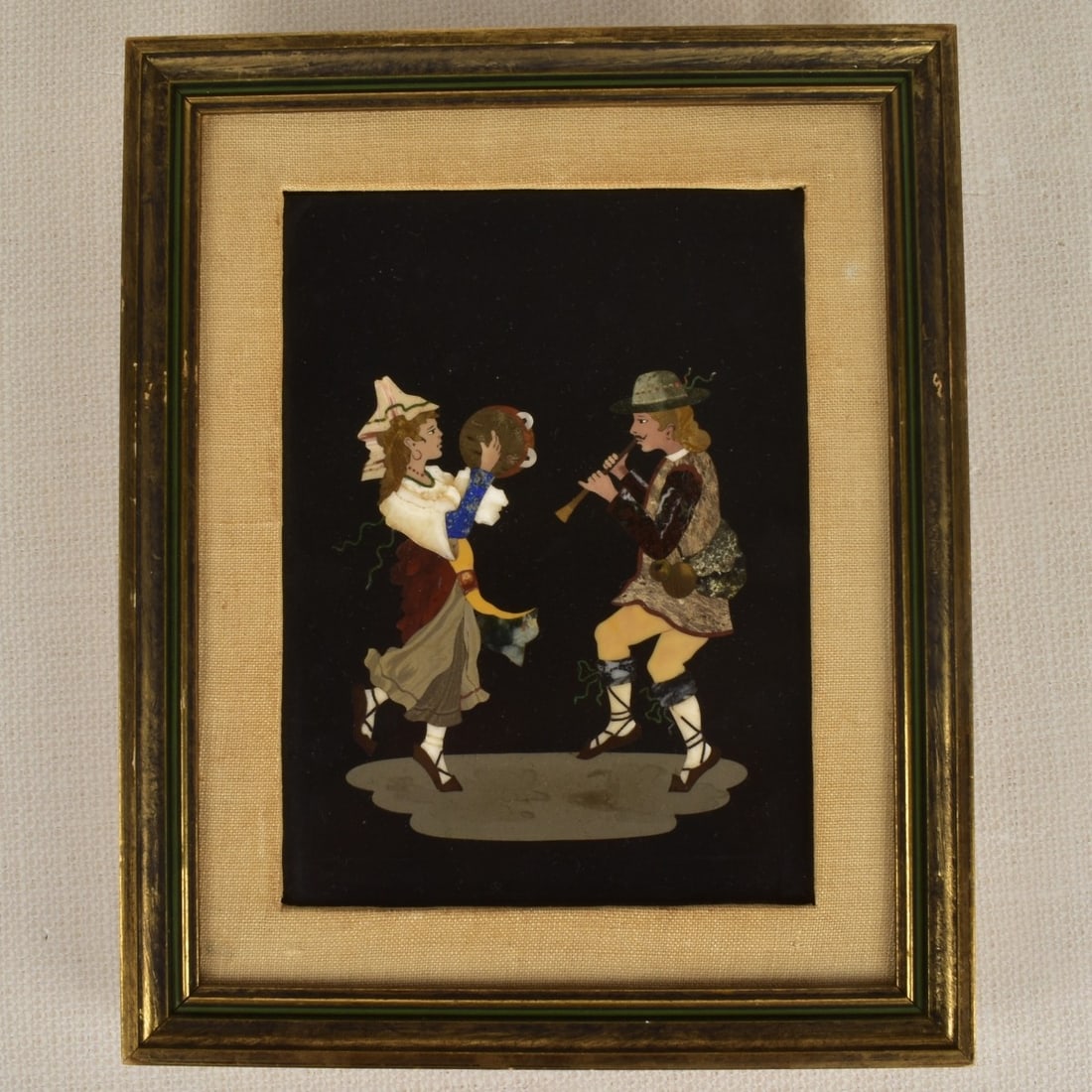 Italian Pietra Dura Plaque: Italian Pietra Dura Plaque of a Man and Lady Playing Musical Instruments and Dancing. Circa 1910. Viewing area measures: 7-1/2: H, 5-3/4" W, frame measures: 11" H, 9" W. Condition: Good condition. Est