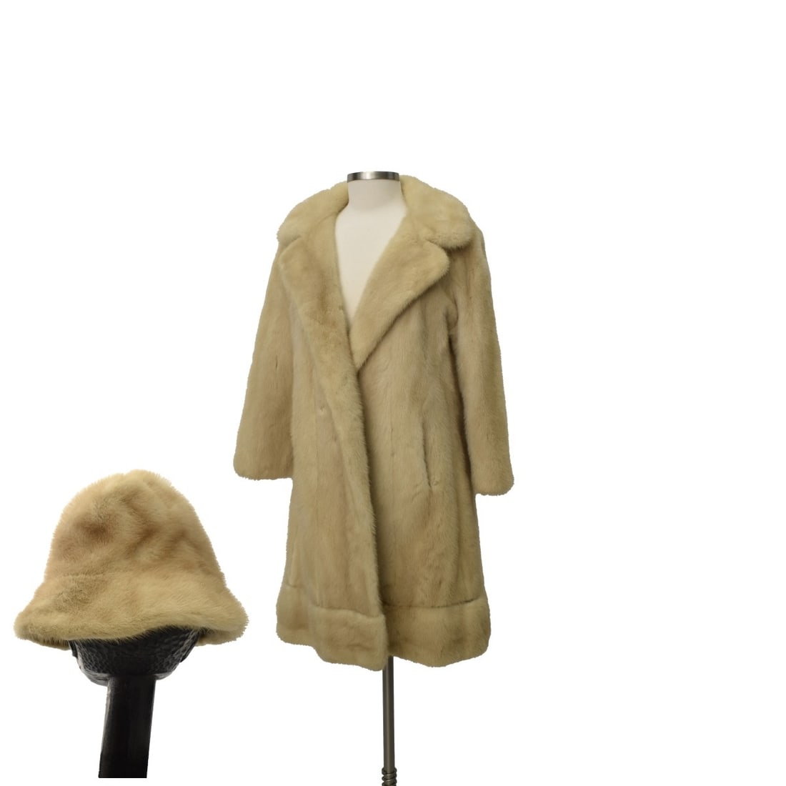 Blond Mink Coat with Matching Hat: Blond Mink Coat with Matching Hat. Unsigned. Measures approx. 38" L to back, underarm to underarm 22", shoulder to shoulder 15", waist 23", sleeve underarm to cuff 13", Hat size 7-7/1/8. Condition: Go