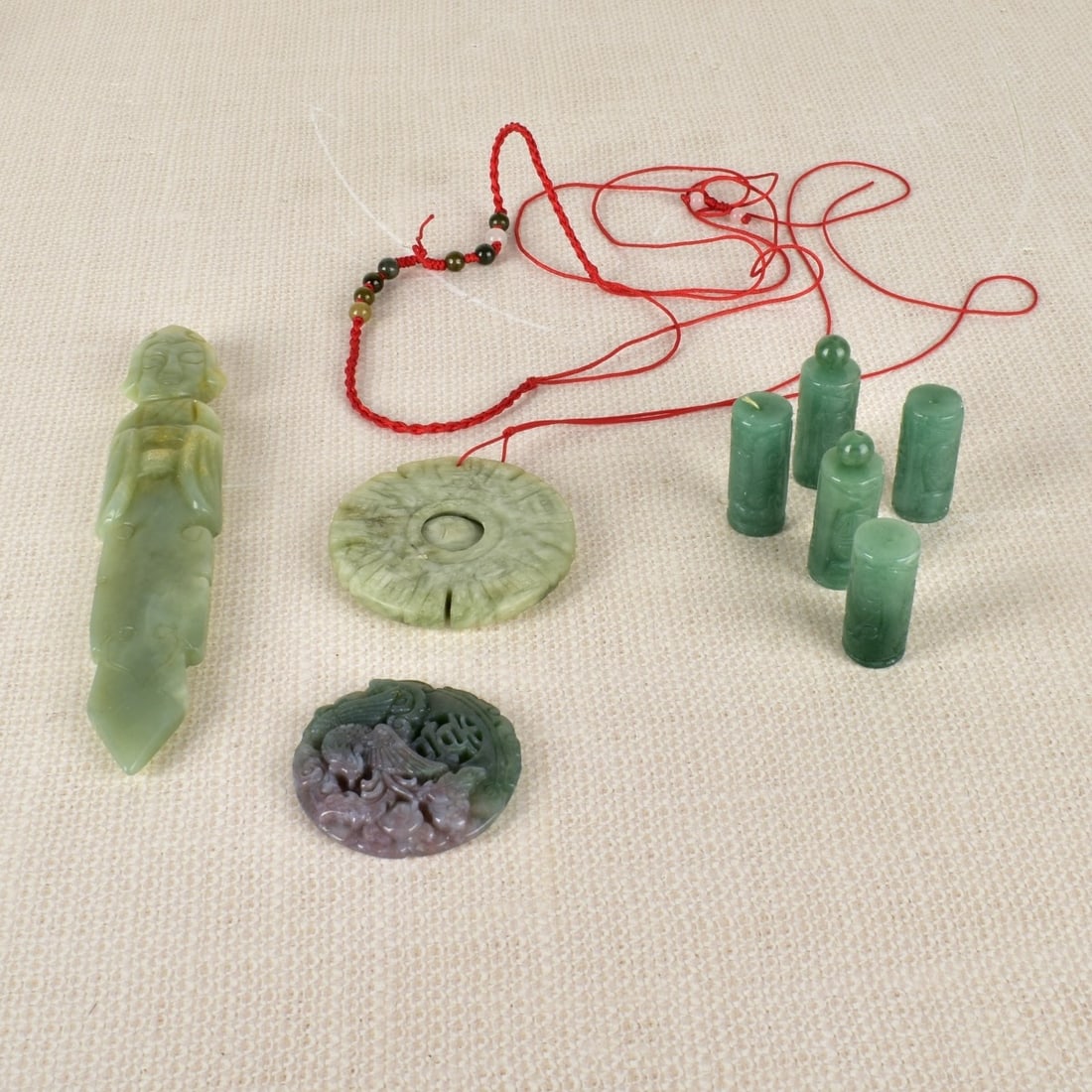 Collection of Jade and Serpentine Pieces: Collection of Jade and Serpentine Pieces. Longest measures: 6" L, 1-1/4" W .25" D. Condition: Good condition. Estimate: $50.00 - $100.00 Domestic Shipping: $46.00