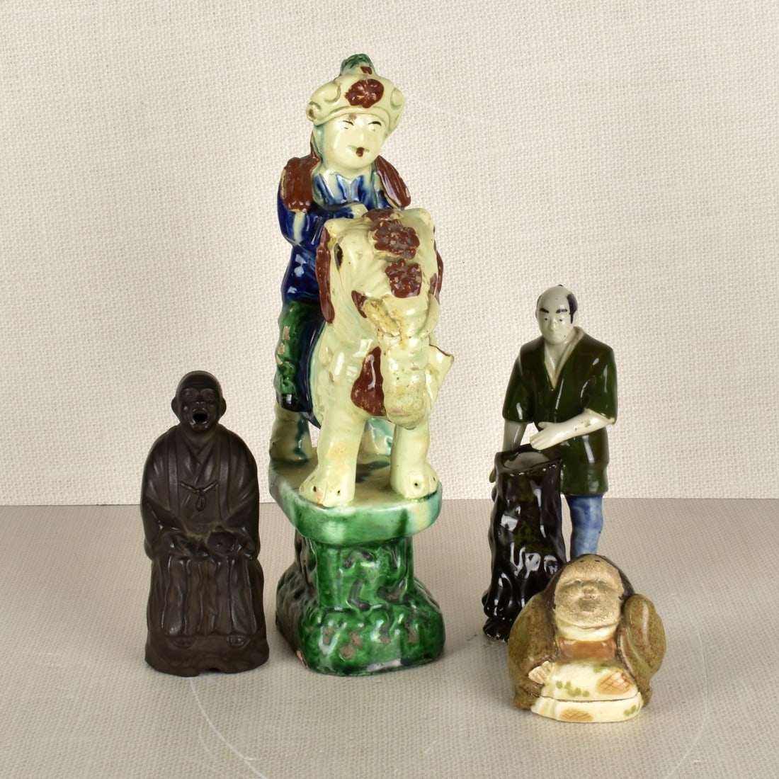 Four (4) Asian Porcelain Figures (1 of 4)