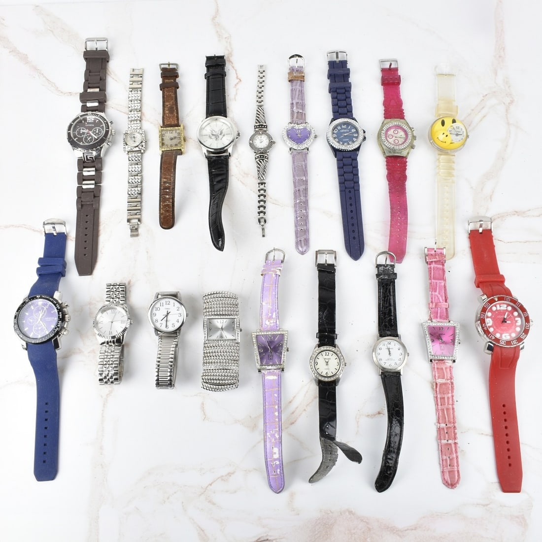 Box Lot of Watches: Box Lot of Eighteen Men's and Lady's Watches. Quartz movements. Various makers and styles. Condition: "As Is", used condition. Need batteries. Worn straps / bracelets on several. Please note the galle