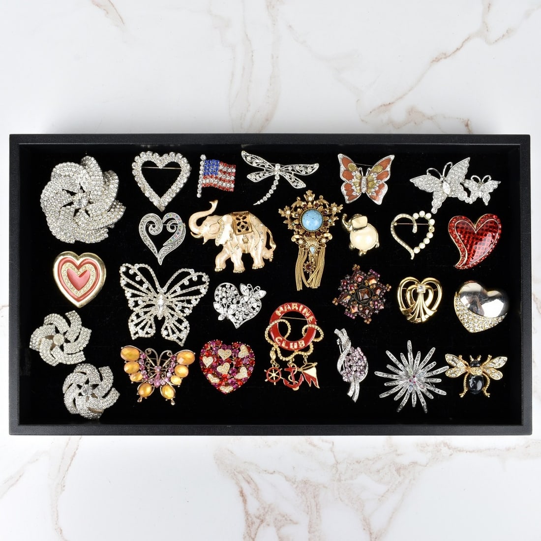 Collection of Fashion Jewelry: Collection of Vintage Fashion Jewelry. To include twenty-four brooches and one pair of earrings. Variously accented with faux diamonds, faux gemstones. enamel and more. Various styles and makers. Cond
