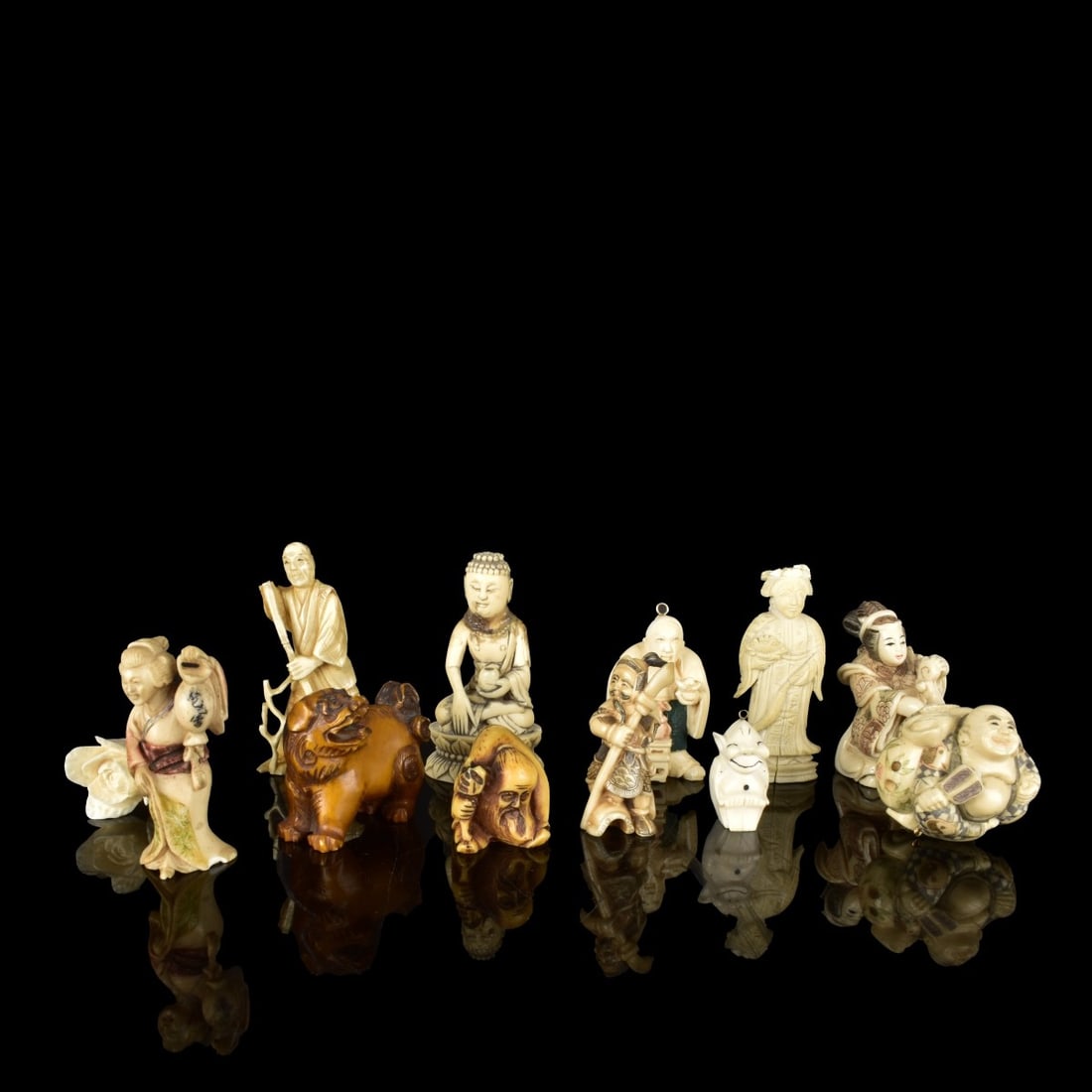 Twelve Asian Carved Figures (1 of 3)