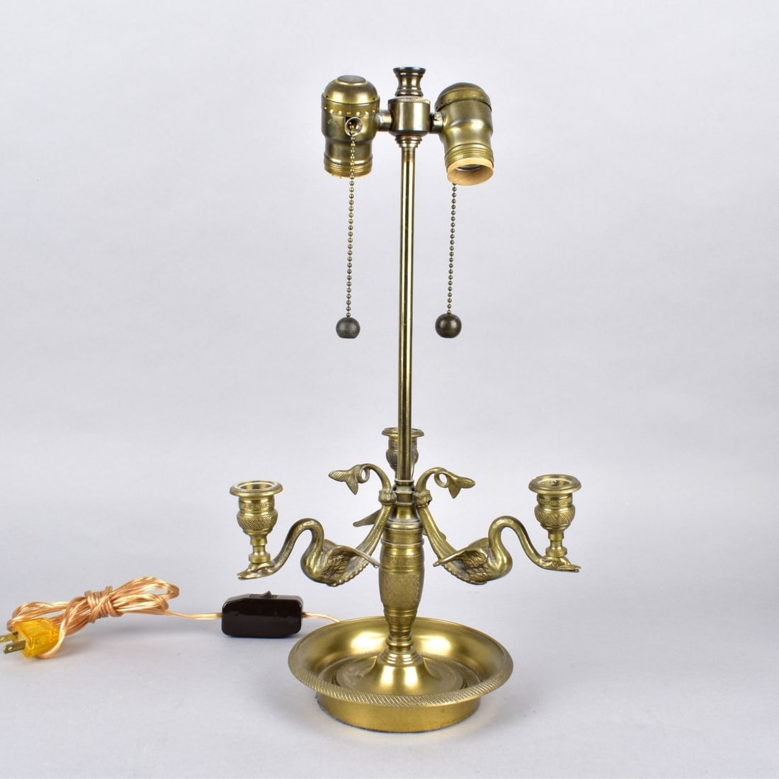 Vintage French Brass Bouilette Lamp: Vintage French Brass Bouillotte Lamp with Swans and Tole Shade. Measures 22" x 13-5/8". Condition: Good condition. Estimate: $50.00 - $200.00 Domestic Shipping: Third party