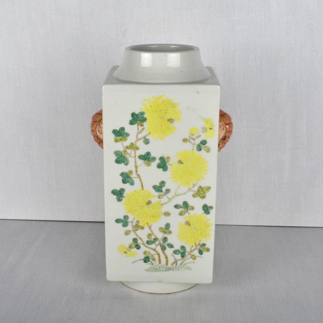 Chinese Famille Verte Porcelain Vase: Chinese Famille Verte Porcelain Vase with Daisies. Bears the Guangxu six (6) character marks. Measures: 12" H, 6-1/2" W, 5-1/4" D. Condition: Good condition. Estimate: $200.00 - $1000.00 Domestic Ship