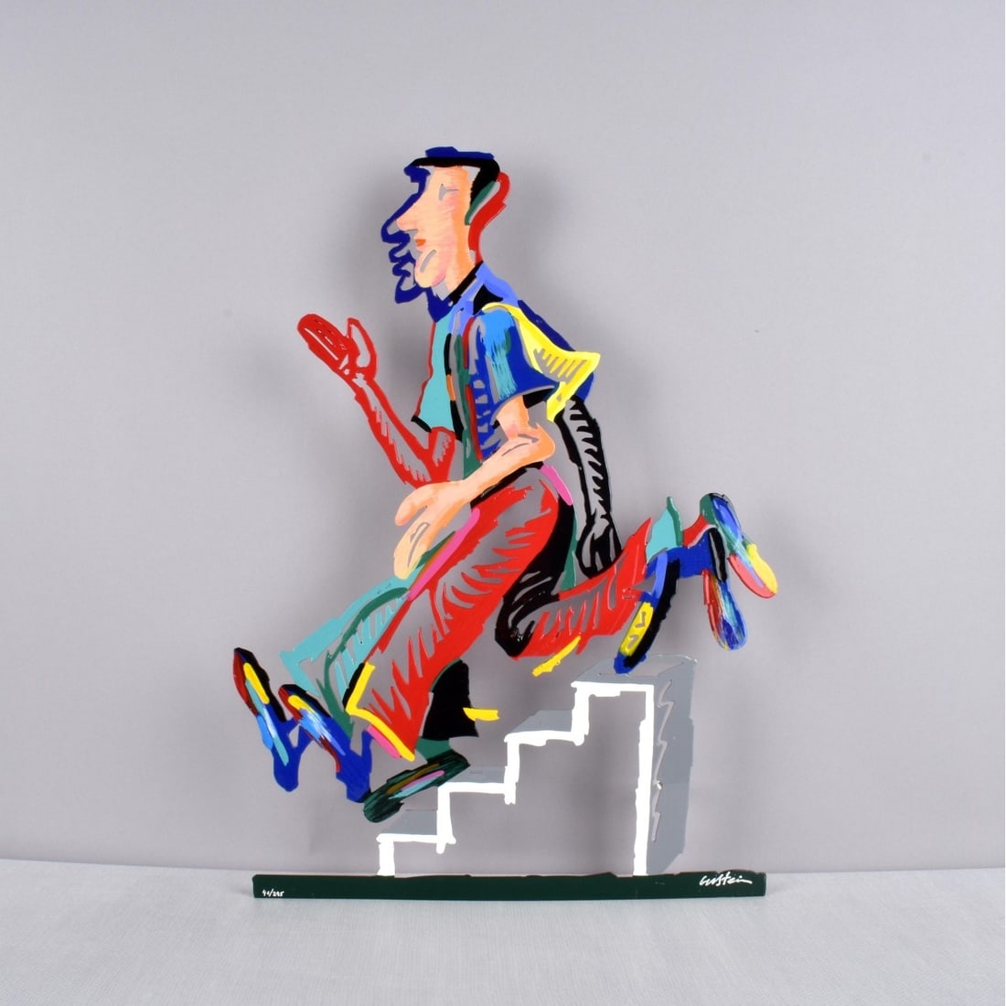 David Gerstein, Israeli (b. 1944): David Gerstein, Israeli (b. 1944) Limited Edition Polychrome Painted Metal Wall Sculpture of a Man Running up Stairs. Artist signed and numbered 41/295. Measures: 19-5/8" H, 14-1/4" W, 2-1/48" D. Cond