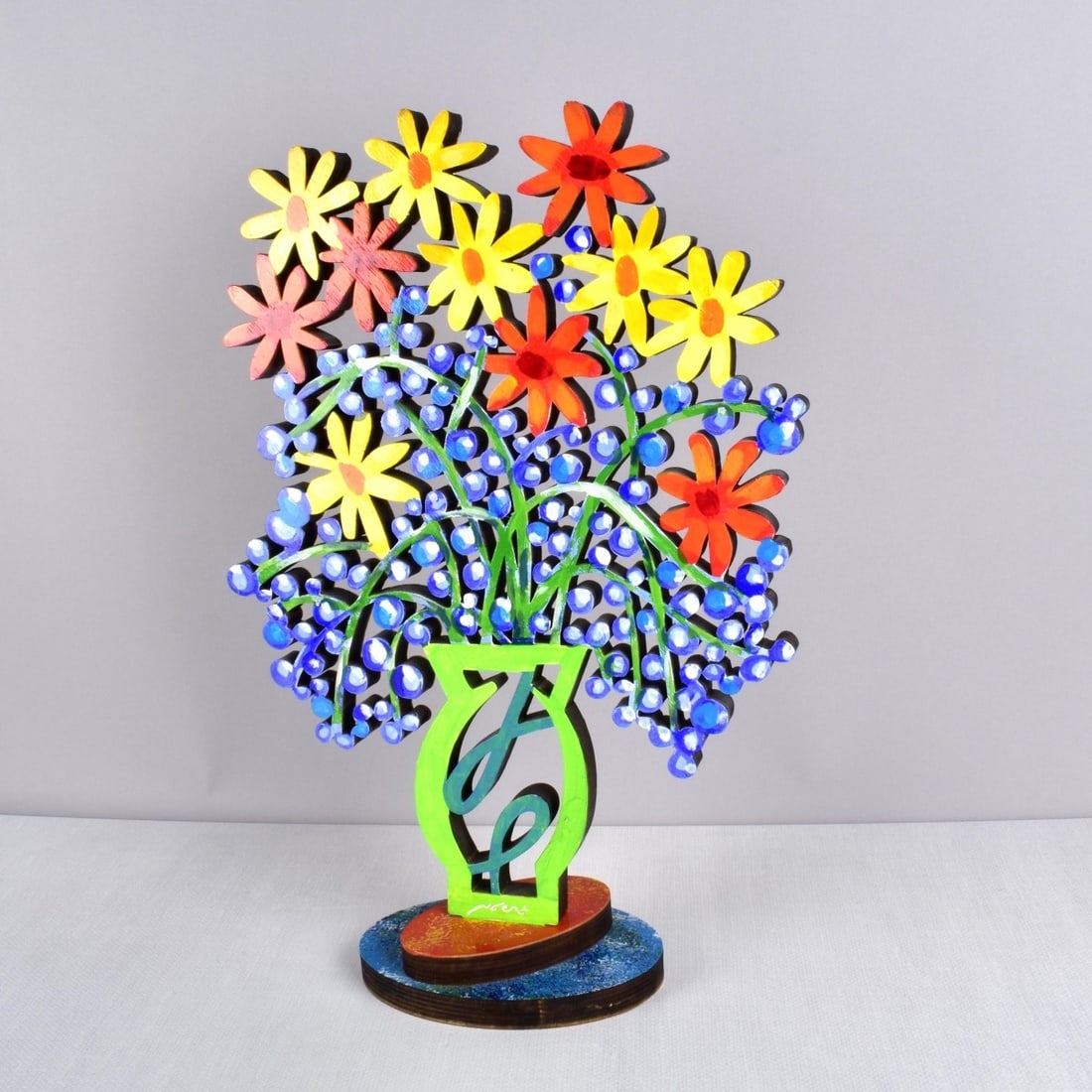 David Gerstein, Israeli (b. 1944): David Gerstein, Israeli (b. 1944) Limited Edition Hand Polychrome Painted Wood Cut of Flowers Titled "Wild Flowers". Artist signed and numbered 113/295. Measures: 19-1/2" H, 12-3/4" W, 5" D. Condition