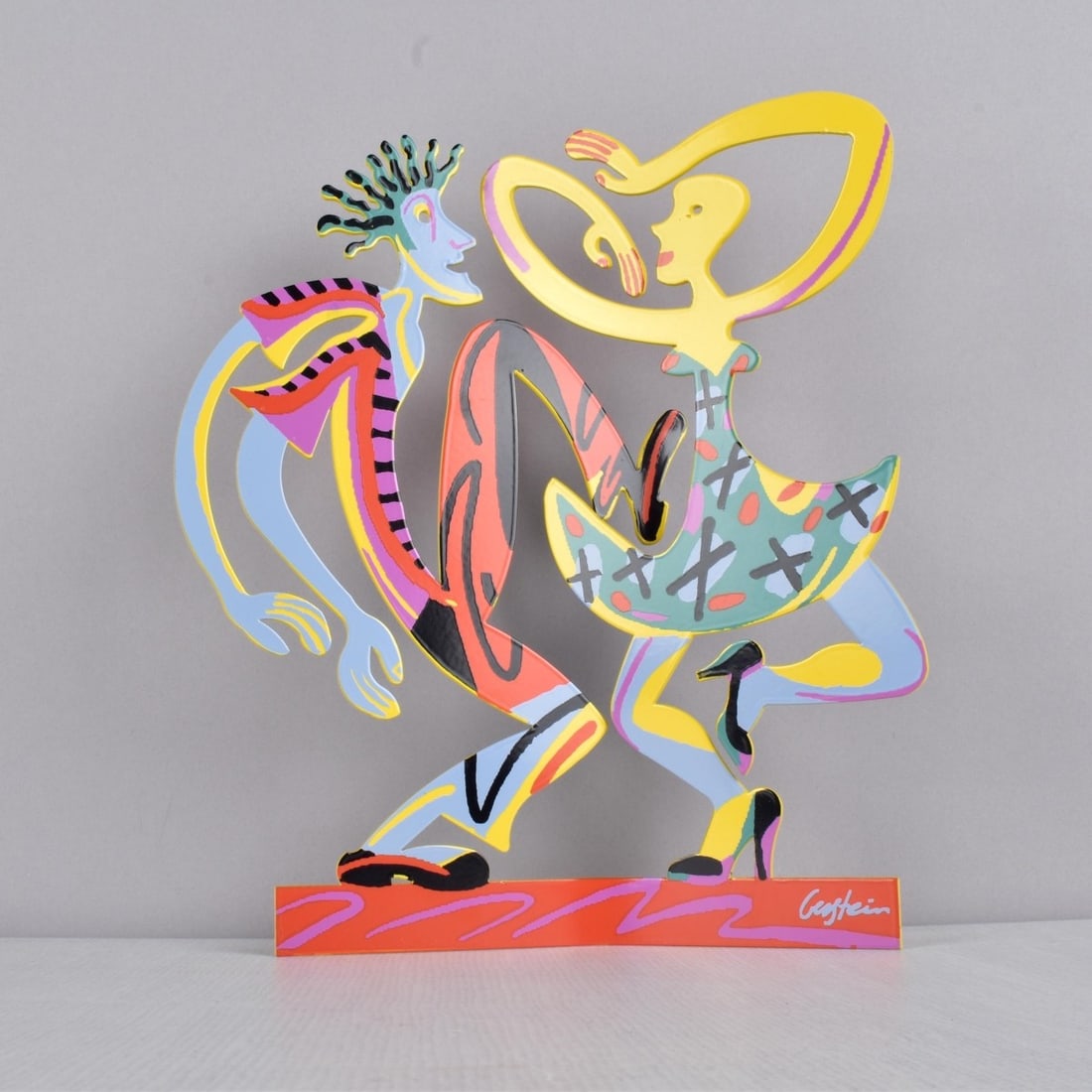 David Gerstein, Israeli (b. 1944): David Gerstein, Israeli (b. 1944) Painted Metal Cut Out Figural Polychrome Painted Sculpture of a Dancing Couple. Artist signed. Measures: 10-1/2" H, 9" W, 2-3/8" D. Condition: Very good condition. Es