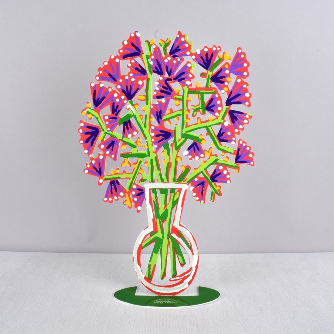David Gerstein, Israeli (b. 1944): David Gerstein, Israeli (b. 1944) Polychrome Painted Metal Cut Out Figural Sculpture of Wild Flowers in a Vase. Artist signed. Measures: 12-1/4" H, 6-1/2" W, 2-3/8" D. Condition: Very good condition.