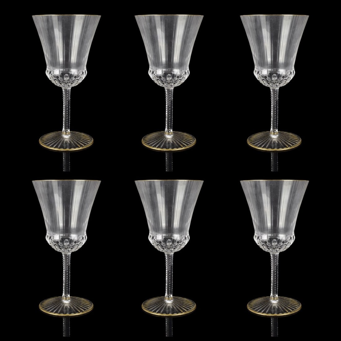 St Louis "Apollo" Wine Stems: Six French St Louis "Apollo" Pattern Crystal Red Wine Stems. Etched mark to base. Measure 7" H, 3-5/8" W (at rim). Condition: Very good condition. Estimate: $300.00 - $500.00 Domestic Shipping: $92.00