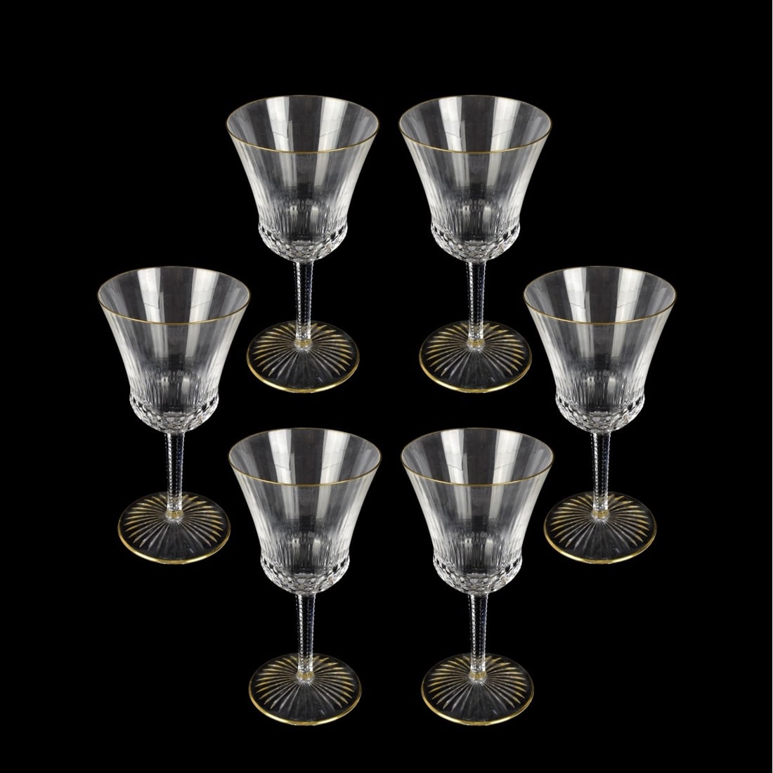 St Louis "Apollo" Wine Stems: Six French St Louis "Apollo" Pattern Crystal White Wine Stems. Etched mark to base. Measure 6-5/8" H, 3-1/4" W (at rim). Condition: Very good condition. Estimate: $250.00 - $450.00 Domestic Shipping: