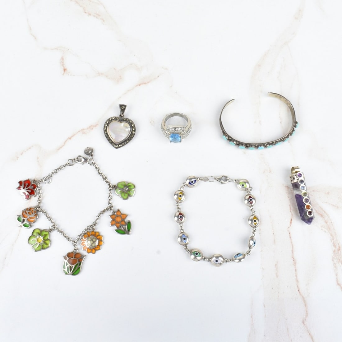 Collection of Vintage Sterling silver Jewelry: Collection of Vintage Sterling silver Jewelry. Consisting of six (6) pieces. Rings bracelets and pendants. Weight : 71.9 grams. Condition: Good condition. Estimate: $50.00 - $150.00 Domestic Shipping: