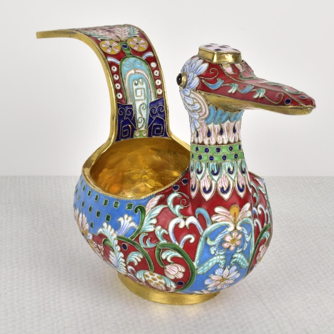 Russian Silver-Gilt and Cloisonne Enamel Kovsh Cup: 20th Century Russian Kovsh Cup in the Form of a Water Bird. Stamped with the mark of Carl Faberge and 88. Featuring fine cloisonne enamel decoration in traditional floral patterns. Measures: 4" H, 7-3