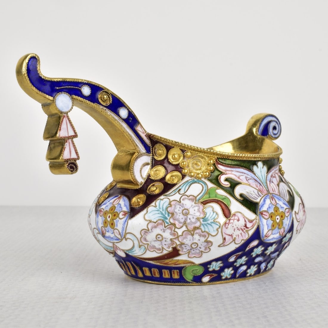 Russian Silver-Gilt and Cloisonne Enamel Kovsh Cup: 20th Century Russian Kovsh Cup. Stamped with the mark of Carl Faberge and 88. Featuring fine cloisonne enamel decoration in traditional floral patterns. Measures: 2-5/8 " H, 4-1/4" W, 2-5/8" D. Total