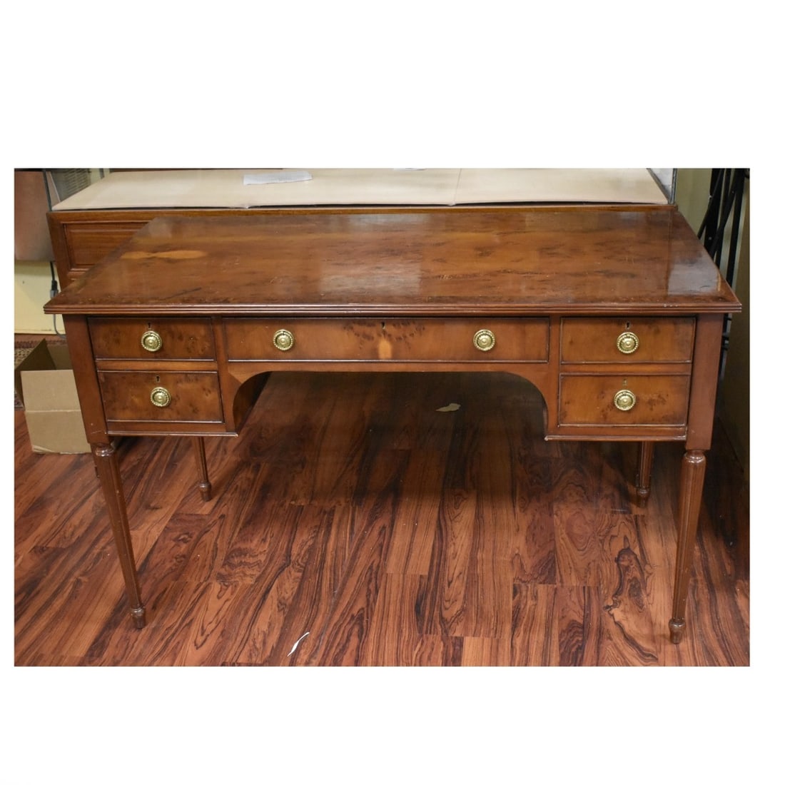 Burlwood Inlay Desk: Burlwood Inlay Desk with Five (5) Drawers. Nicely edged in a burlwood edging. Four (4) drawers front. Measures: 30"H,48"W 24"D. Condition: Good condition normal wear.