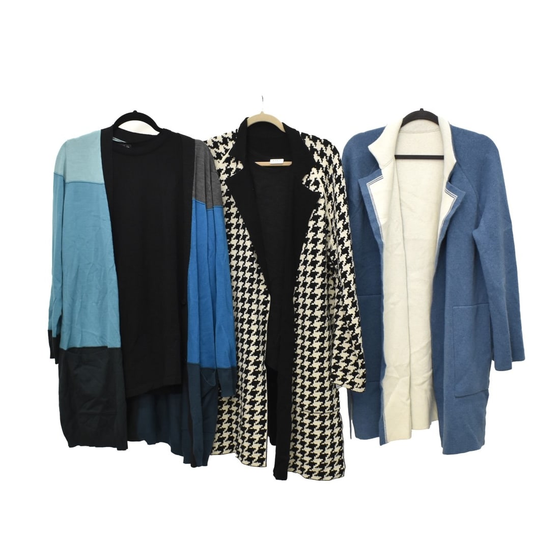 Akris Designer Coats and Pullovers: Five (5) pieces Akris Designer Coats and Pullovers. Hounds tooth 100% cashmere coat with tag $3990, size 16. Blue & White reversible 100% cashmere Coat, Turquoise Blues & grey 100% wool sweater size 1