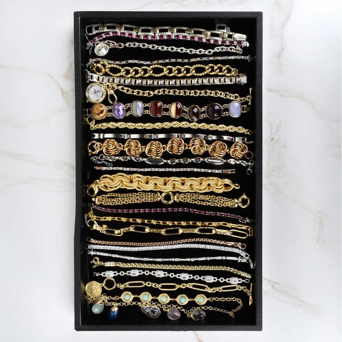 Collection of Fashion Jewelry: Collection of Fashion Jewelry. Consisting of twenty-six (26) bracelets with various accents, color stones, hardstones and more. Various makers and styles. Condition: Good condition. Estimate: $50.00 -